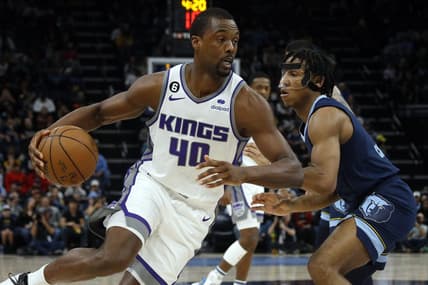 Jan 1, 2023; Memphis, Tennessee, USA; Sacramento Kings forward Harrison Barnes (40) drives to the basket as Memphis Grizzlies guard Kennedy Chandler (1) defends during the first half at FedExForum. Mandatory Credit: Petre Thomas-USA TODAY Sports