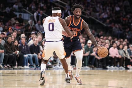 Jan 2, 2023; New York, New York, USA; New York Knicks forward Julius Randle (30) looks to drive past Phoenix Suns forward Torrey Craig (0) in the first quarter at Madison Square Garden. Mandatory Credit: Wendell Cruz-USA TODAY Sports