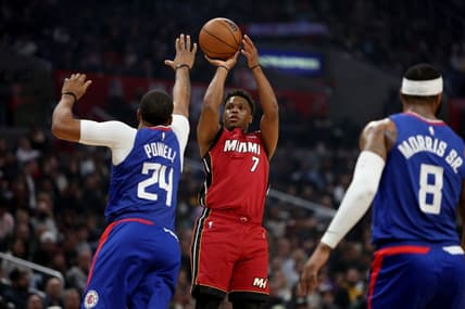 Jan 2, 2023; Los Angeles, California, USA;  Miami Heat guard Kyle Lowry (7) shoots the ball over Los Angeles Clippers forward Norman Powell (24) during the first quarter at Crypto.com Arena. Mandatory Credit: Kiyoshi Mio-USA TODAY Sports