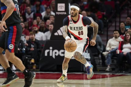 Jan 2, 2023; Portland, Oregon, USA;  Portland Trail Blazers guard Gary Payton II (00) dribbles the ball during the second half against the Detroit Pistons at Moda Center. The Trail Blazers won 135-106. Mandatory Credit: Troy Wayrynen-USA TODAY Sports
