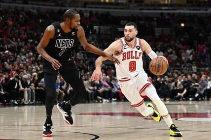 Jan 4, 2023; Chicago, Illinois, USA; Chicago Bulls guard Zach LaVine (8) drives in the first half against Brooklyn Nets forward Kevin Durant (7) at United Center. Mandatory Credit: Quinn Harris-USA TODAY Sports