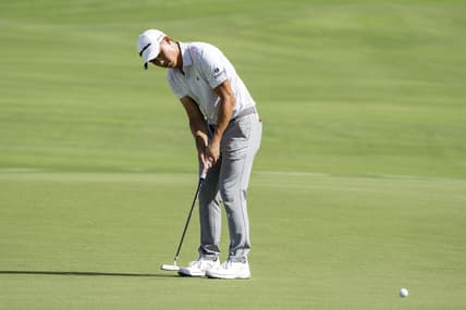 January 5, 2023; Maui, Hawaii, USA; Collin Morikawa putts on the 18th hole during the first round of the Sentry Tournament of Champions golf tournament at Kapalua Resort - The Plantation Course. Mandatory Credit: Kyle Terada-USA TODAY Sports