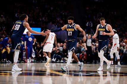 Jan 5, 2023; Denver, Colorado, USA; Denver Nuggets forward Aaron Gordon (50) reacts with guard Jamal Murray (27) and center Nikola Jokic (15) in the first quarter against the Los Angeles Clippers at Ball Arena. Mandatory Credit: Isaiah J. Downing-USA TODAY Sports