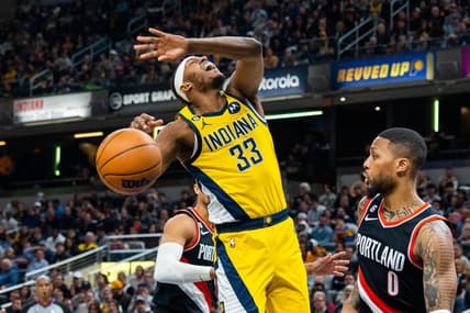 Jan 6, 2023; Indianapolis, Indiana, USA; Indiana Pacers center Myles Turner (33) shoots the ball while Portland Trail Blazers guard Damian Lillard (0) defends in the second quarter at Gainbridge Fieldhouse. Mandatory Credit: Trevor Ruszkowski-USA TODAY Sports