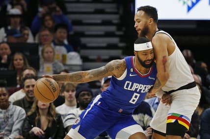 Jan 6, 2023; Minneapolis, Minnesota, USA; Los Angeles Clippers forward Marcus Morris (8) works against Minnesota Timberwolves center Rudy Gobert (27) in the first quarter at Target Center. Mandatory Credit: Bruce Kluckhohn-USA TODAY Sports