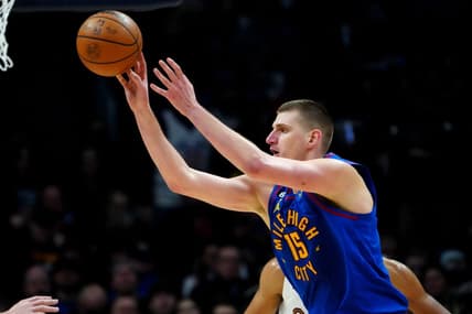 Jan 6, 2023; Denver, Colorado, USA; Denver Nuggets center Nikola Jokic (15) passes the ball in the second half against the Cleveland Cavaliers at Ball Arena. Mandatory Credit: Ron Chenoy-USA TODAY Sports