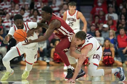 Jan 7, 2023; Tucson, Arizona, USA; Arizona Wildcats guard Courtney Ramey (0) and Arizona Wildcats center Oumar Ballo (11) defend against Washington State Cougars guard TJ Bamba (5) during the second half at McKale Center. Mandatory Credit: Joe Camporeale-USA TODAY Sports