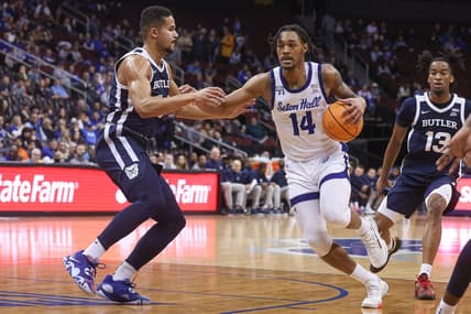 Jan 7, 2023; Newark, New Jersey, USA; Seton Hall Pirates guard Dre Davis (14) drives to the basket against Butler Bulldogs guard Pierce Thomas (14) during the second half at Prudential Center. Mandatory Credit: Vincent Carchietta-USA TODAY Sports