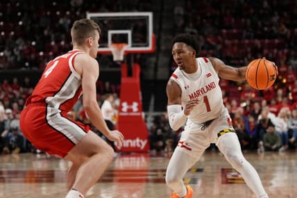 Jan 8, 2023; College Park, Maryland, USA; Maryland Terrapins guard Jahmir Young (1) dribbles the ball while being guarded by Ohio State Buckeyes guard Sean McNeil (4) in the second half at Xfinity Center. Mandatory Credit: Brent Skeen-USA TODAY Sports