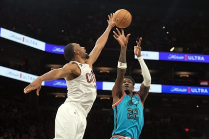 Jan 8, 2023; Phoenix, Arizona, USA; Phoenix Suns center Deandre Ayton (22) shoots over Cleveland Cavaliers forward Evan Mobley (4) during the first half at Footprint Center. Mandatory Credit: Joe Camporeale-USA TODAY Sports