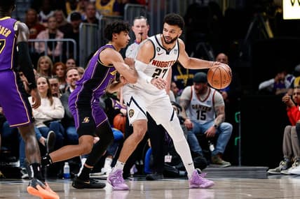 Jan 9, 2023; Denver, Colorado, USA; Denver Nuggets guard Jamal Murray (27) controls the ball as Los Angeles Lakers guard Max Christie (10) guards in the second quarter at Ball Arena. Mandatory Credit: Isaiah J. Downing-USA TODAY Sports