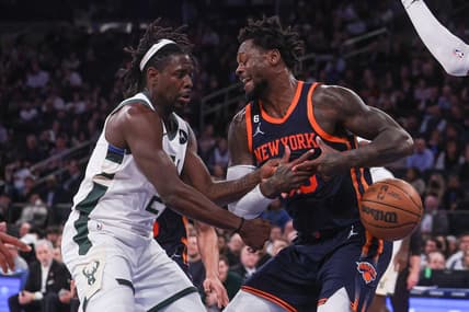 Jan 9, 2023; New York, New York, USA; Milwaukee Bucks guard Jrue Holiday (21) knocks the ball away from New York Knicks forward Julius Randle (30) during the fourth quarter at Madison Square Garden. Mandatory Credit: Vincent Carchietta-USA TODAY Sports