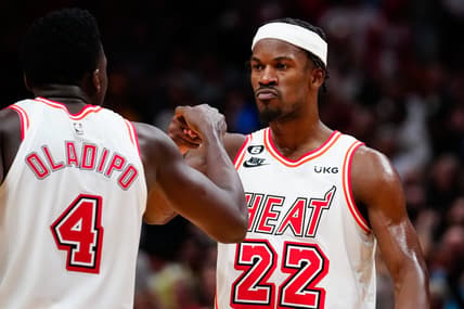 Jan 10, 2023; Miami, Florida, USA; Miami Heat forward Jimmy Butler (22) celebrates with guard Victor Oladipo (4) after scoring against the Oklahoma City Thunder during the fourth quarter at FTX Arena. Mandatory Credit: Rich Storry-USA TODAY Sports