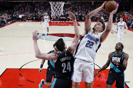 Jan 10, 2023; Portland, Oregon, USA; ]Orlando Magic small forward Franz Wagner (22) shoots the ball against Portland Trail Blazers power forward Drew Eubanks (24) during the first half at Moda Center. Mandatory Credit: Soobum Im-USA TODAY Sports