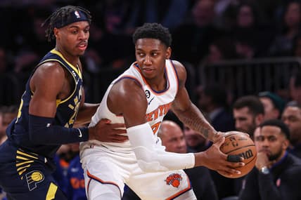 Jan 11, 2023; New York, New York, USA; New York Knicks guard RJ Barrett (9) shields the ball from Indiana Pacers guard Buddy Hield (24) during the second quarter at Madison Square Garden. Mandatory Credit: Vincent Carchietta-USA TODAY Sports