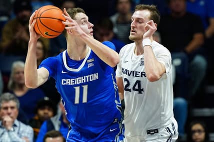 Creighton Bluejays center Ryan Kalkbrenner (11) turns toward the basket as Xavier Musketeers forward Jack Nunge (24) defends in the second half of a college basketball game, Wednesday, Jan. 11, 2023, at Cintas Center in Cincinnati. The Xavier Musketeers won, 90-87.

Creighton Bluejays At Xavier Musketeers Jan 11 0287
