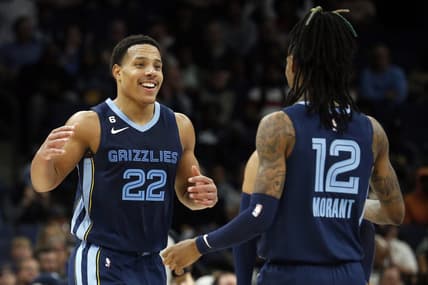 Jan 11, 2023; Memphis, Tennessee, USA; Memphis Grizzlies guard Desmond Bane (22) reacts with Memphis Grizzlies guard Ja Morant (12) after a basket during the second half against the San Antonio Spurs at FedExForum. Mandatory Credit: Petre Thomas-USA TODAY Sports