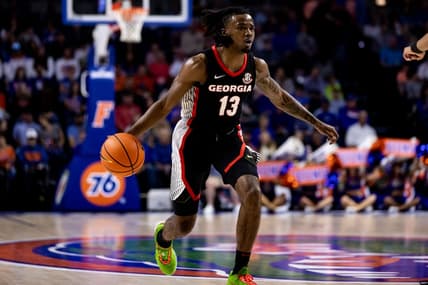 Jan 7, 2023; Gainesville, Florida, USA; Georgia Bulldogs guard Mardrez McBride (13) dribbles the ball during the first half against the Florida Gators at Exactech Arena at the Stephen C. O'Connell Center. Mandatory Credit: Matt Pendleton-USA TODAY Sports