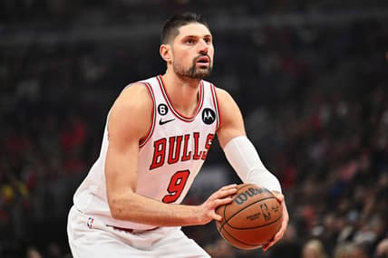 Jan 7, 2023; Chicago, Illinois, USA;  Chicago Bulls center Nikola Vucevic (9) controls the ball against the Utah Jazz at United Center. Mandatory Credit: Jamie Sabau-USA TODAY Sports