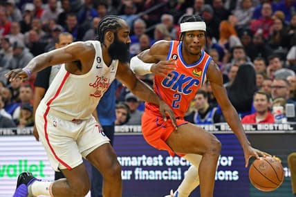 Jan 12, 2023; Philadelphia, Pennsylvania, USA; Oklahoma City Thunder guard Shai Gilgeous-Alexander (2) drives to the basket against Philadelphia 76ers guard James Harden (1) during the third quarter at Wells Fargo Center. Mandatory Credit: Eric Hartline-USA TODAY Sports