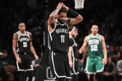 Jan 12, 2023; Brooklyn, New York, USA;  Brooklyn Nets guard Kyrie Irving (11) reacts after committing a foul in the fourth quarter against the Boston Celtics at Barclays Center. Mandatory Credit: Wendell Cruz-USA TODAY Sports
