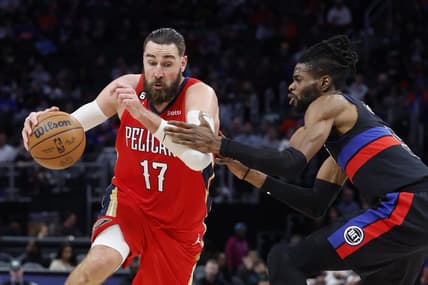 Jan 13, 2023; Detroit, Michigan, USA;  New Orleans Pelicans center Jonas Valanciunas (17) dribbles on Detroit Pistons guard Nerlens Noel (9) in the second half at Little Caesars Arena. Mandatory Credit: Rick Osentoski-USA TODAY Sports