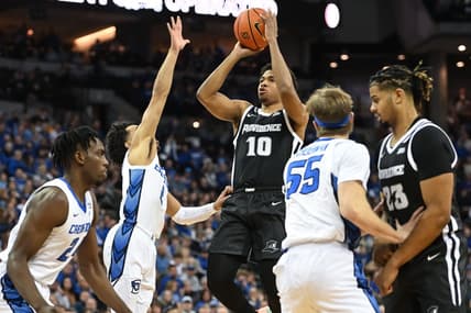 Jan 14, 2023; Omaha, Nebraska, USA;  Providence Friars guard Noah Locke (10) attempts a shot over Creighton Bluejays guard Ryan Nembhard (2) in the first half at CHI Health Center Omaha. Mandatory Credit: Steven Branscombe-USA TODAY Sports