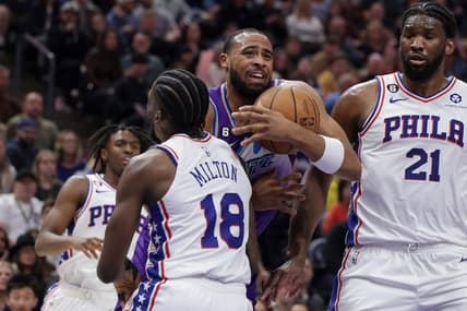 Jan 14, 2023; Salt Lake City, Utah, USA; Utah Jazz guard Talen Horton-Tucker (0) tries to get past Philadelphia 76ers guard Shake Milton (18) and to the basket during the second half at Vivint Arena. Mandatory Credit: Chris Nicoll-USA TODAY Sports