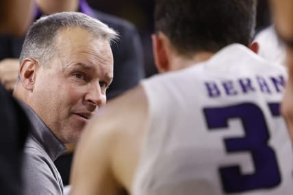 Jan 15, 2023; Ann Arbor, Michigan, USA;  Northwestern Wildcats coach Chris Collins talks to forward Robbie Beran (31) in the first half at Crisler Center. Mandatory Credit: Rick Osentoski-USA TODAY Sports
