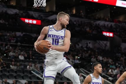 Jan 15, 2023; San Antonio, Texas, USA;  Sacramento Kings forward Domantas Sabonis (10) rebounds in the first half against the San Antonio Spurs at the AT&T Center. Mandatory Credit: Daniel Dunn-USA TODAY Sports