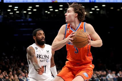 Jan 15, 2023; Brooklyn, New York, USA; Oklahoma City Thunder guard Josh Giddey (3) drives to the basket against Brooklyn Nets guard Kyrie Irving (11) during the fourth quarter at Barclays Center. Mandatory Credit: Brad Penner-USA TODAY Sports