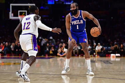 Jan 15, 2023; Los Angeles, California, USA; Philadelphia 76ers guard James Harden (1) controls the ball against Los Angeles Lakers guard Kendrick Nunn (12) during the first half at Crypto.com Arena. Mandatory Credit: Gary A. Vasquez-USA TODAY Sports