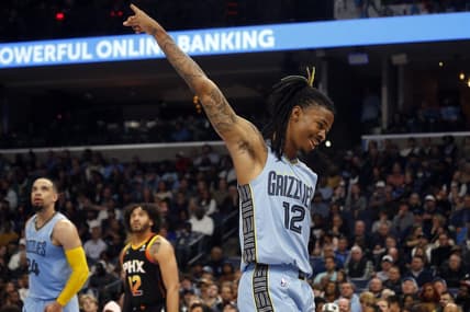 Jan 16, 2023; Memphis, Tennessee, USA; Memphis Grizzlies guard Ja Morant (12) reacts during the second half against the Phoenix Suns at FedExForum. Mandatory Credit: Petre Thomas-USA TODAY Sports