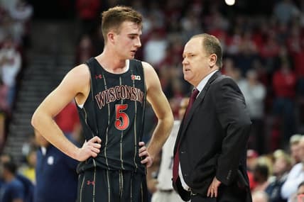 Jan 17, 2023; Madison, Wisconsin, USA;  Wisconsin Badgers forward Tyler Wahl (5) talks with Wisconsin Badgers head coach Greg Gard during the second half against the Penn State Nittany Lions at the Kohl Center. Mandatory Credit: Kayla Wolf-USA TODAY Sports