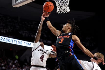 Jan 18, 2023; College Station, Texas, USA; Texas A&M Aggies guard Wade Taylor IV (4) and Florida Gators forward Alex Fudge (3) pursue a rebound during the first half at Reed Arena. Mandatory Credit: Erik Williams-USA TODAY Sports