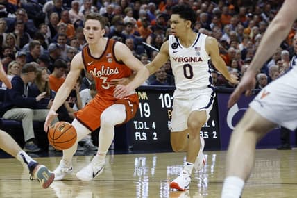 Jan 18, 2023; Charlottesville, Virginia, USA; Virginia Tech Hokies guard Sean Pedulla (3) drives to the basket as Virginia Cavaliers guard Kihei Clark (0) defends in the first half at John Paul Jones Arena. Mandatory Credit: Geoff Burke-USA TODAY Sports