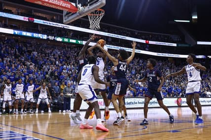 Jan 18, 2023; Newark, New Jersey, USA; Seton Hall Pirates forward KC Ndefo (13) scores a basket after being fouled by Connecticut Huskies forward Adama Sanogo (21) during the second half in front of guard Kadary Richmond (0) and guard Andre Jackson Jr. (44) at Prudential Center. Mandatory Credit: Vincent Carchietta-USA TODAY Sports