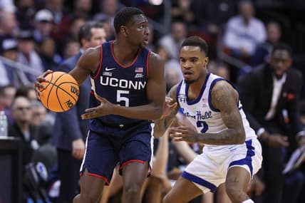 Jan 18, 2023; Newark, New Jersey, USA; Connecticut Huskies guard Hassan Diarra (5) dribbles as Seton Hall Pirates guard Al-Amir Dawes (2) defends during the second half at Prudential Center. Mandatory Credit: Vincent Carchietta-USA TODAY Sports