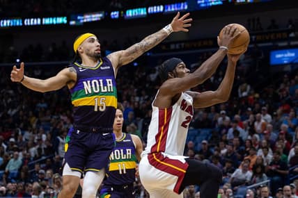 Jan 18, 2023; New Orleans, Louisiana, USA; Miami Heat forward Jimmy Butler (22) drives to the basket against New Orleans Pelicans guard Jose Alvarado (15) during the first half at Smoothie King Center. Mandatory Credit: Stephen Lew-USA TODAY Sports