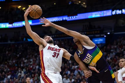Jan 18, 2023; New Orleans, Louisiana, USA; New Orleans Pelicans guard Trey Murphy III (25) defends Miami Heat guard Max Strus (31) during the first half at Smoothie King Center. Mandatory Credit: Stephen Lew-USA TODAY Sports