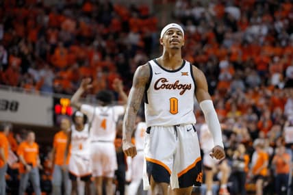 Oklahoma State Cowboys guard Avery Anderson III (0) celebrates during a men's Bedlam college basketball game between the Oklahoma State University Cowboys (OSU) and the University of Oklahoma Sooners (OU) at Gallagher-Iba Arena in Stillwater, Okla., Wednesday, Jan. 18, 2023. Oklahoma State won 72-56.

cover main
