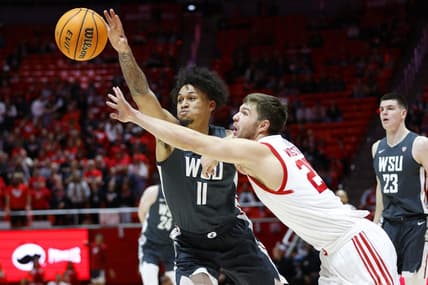 Jan 19, 2023; Salt Lake City, Utah, USA; Washington State Cougars forward DJ Rodman (11) and Utah Utes guard Rollie Worster (25) battle in the first half at Jon M. Huntsman Center. Mandatory Credit: Jeffrey Swinger-USA TODAY Sports