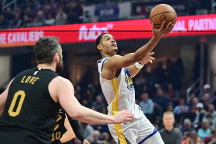 Jan 20, 2023; Cleveland, Ohio, USA; Golden State Warriors guard Jordan Poole (3) drives to the basket against the Cleveland Cavaliers during the first half at Rocket Mortgage FieldHouse. Mandatory Credit: Ken Blaze-USA TODAY Sports
