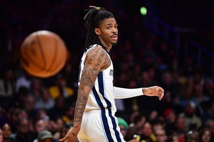 January 20, 2023; Los Angeles, California, USA; Memphis Grizzlies guard Ja Morant (12) reacts against the Los Angeles Lakers during the first half at Crypto.com Arena. Mandatory Credit: Gary A. Vasquez-USA TODAY Sports