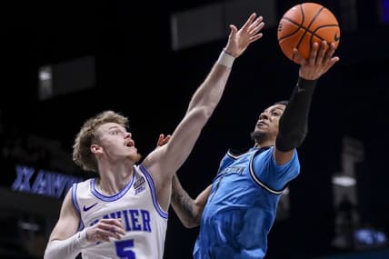 Jan 21, 2023; Cincinnati, Ohio, USA; Georgetown Hoyas guard Primo Spears (1) shoots against Xavier Musketeers guard Adam Kunkel (5) in the first half at Cintas Center. Mandatory Credit: Katie Stratman-USA TODAY Sports