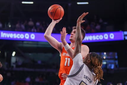 Jan 21, 2023; Atlanta, Georgia, USA; Syracuse Orange guard Joseph Girard III (11) shoots past Georgia Tech Yellow Jackets guard Deivon Smith (5) in the first half at McCamish Pavilion. Mandatory Credit: Brett Davis-USA TODAY Sports