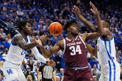 Jan 21, 2023; Lexington, Kentucky, USA; Texas A&M Aggies forward Julius Marble (34) goes after a loose ball during the first half against the Kentucky Wildcats at Rupp Arena at Central Bank Center. Mandatory Credit: Jordan Prather-USA TODAY Sports