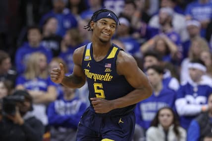 Jan 21, 2023; Newark, New Jersey, USA; Marquette Golden Eagles guard Chase Ross (5) reacts after a basket against the Seton Hall Pirates during the second half at Prudential Center. Mandatory Credit: Vincent Carchietta-USA TODAY Sports