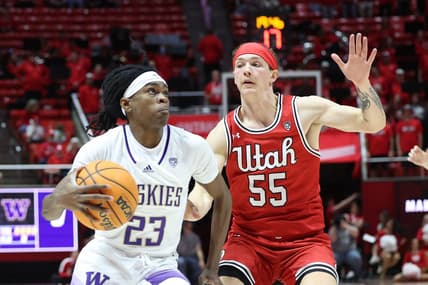 Jan 21, 2023; Salt Lake City, Utah, USA;  Washington Huskies guard Keyon Menifield (23) drives to the basket against Utah Utes guard Gabe Madsen (55) in the first half at Jon M. Huntsman Center. Mandatory Credit: Rob Gray-USA TODAY Sports