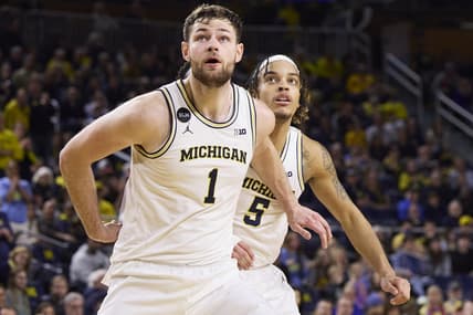 Jan 22, 2023; Ann Arbor, Michigan, USA; Michigan Wolverines center Hunter Dickinson (1) and forward Terrance Williams II (5) look for the rebound in the second half against the Minnesota Golden Gophers at Crisler Center. Mandatory Credit: Rick Osentoski-USA TODAY Sports